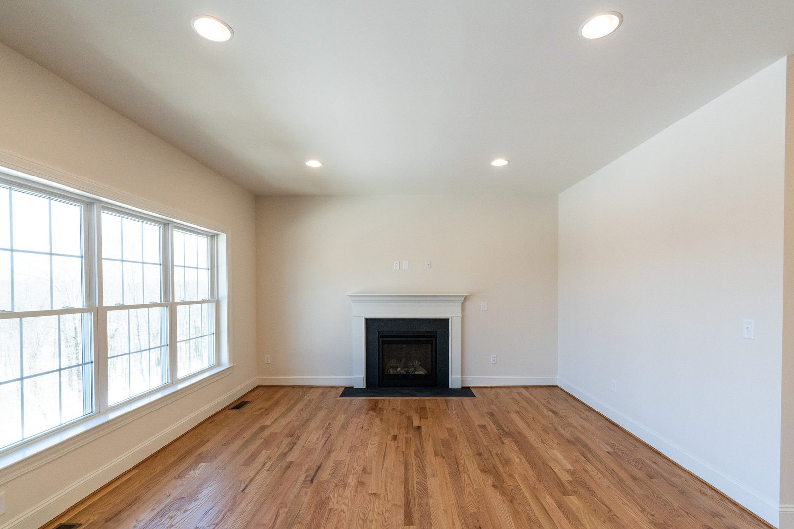 The Groton: family room with fireplace